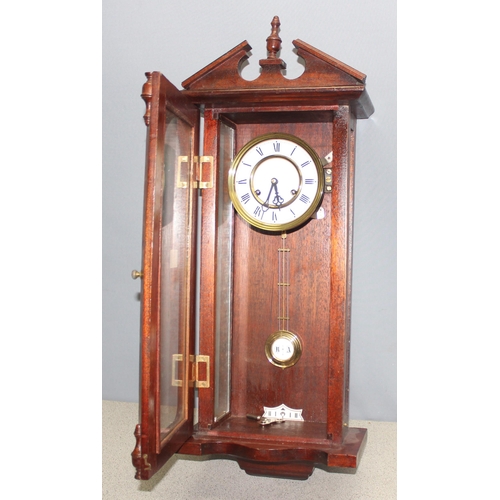 1363 - Antique mahogany cased mechanical wall clock with pendulum and key, approx 75cm