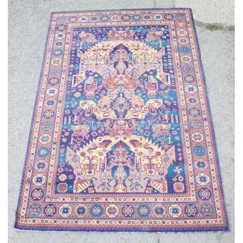 225 - A highly decorative Turkish made Kayam rug of blue ground, approx 225cm x 151cm