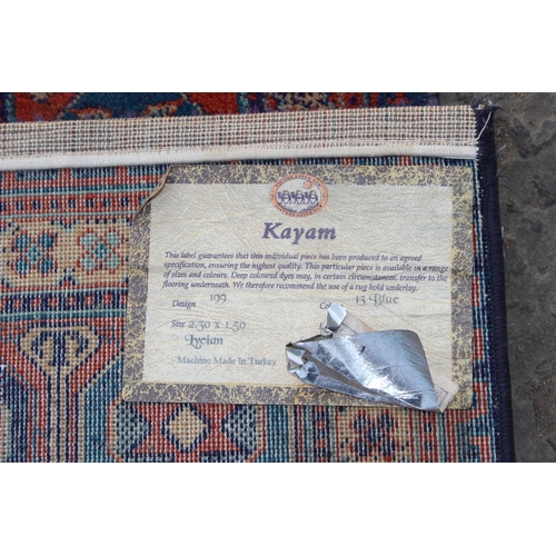 225 - A highly decorative Turkish made Kayam rug of blue ground, approx 225cm x 151cm