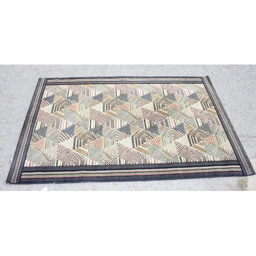 227 - An unusual retro style geometric rug by Missoni Masters, approx 125cm wide x 90cm deep