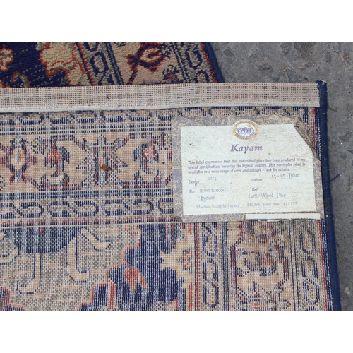 229 - A highly decorative Turkish made Kayam runner rug of blue ground, approx 200cm wide x 80cm deep