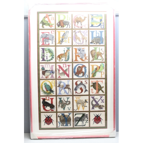 460J - Large animal alphabet rug made from an Elizabeth Bradley tapestry kit in frame, approx 138cm x 87cm