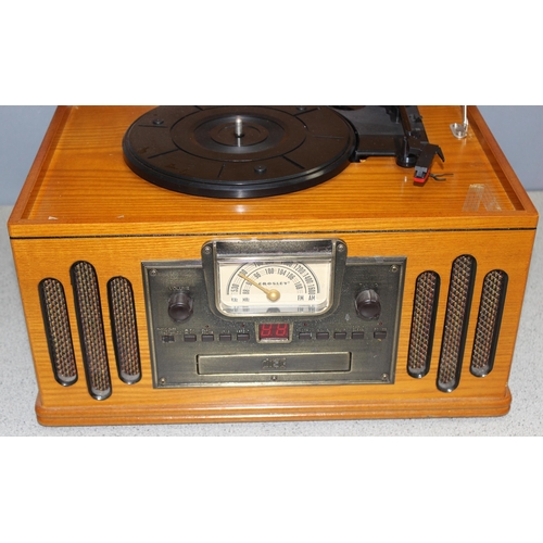 764 - Vintage style turntable and CD player in wooden case by Crosley, Model No. 2414