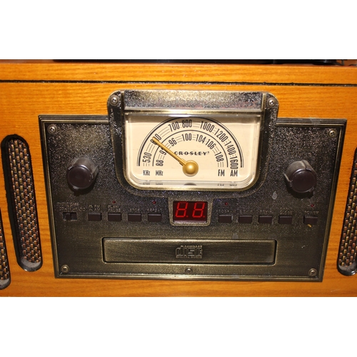 764 - Vintage style turntable and CD player in wooden case by Crosley, Model No. 2414