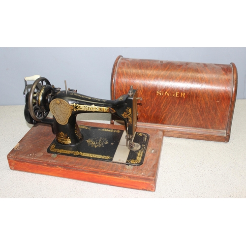 821 - Vintage Singer sewing machine in wooden case