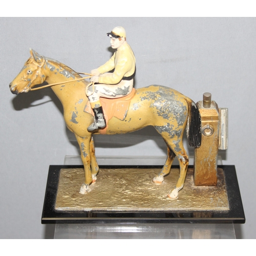 1655A - Austrian made cold painted spelter table lighter in the form of a jockey on horseback, approx 18cm