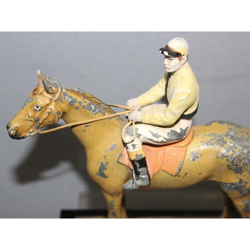 1655A - Austrian made cold painted spelter table lighter in the form of a jockey on horseback, approx 18cm