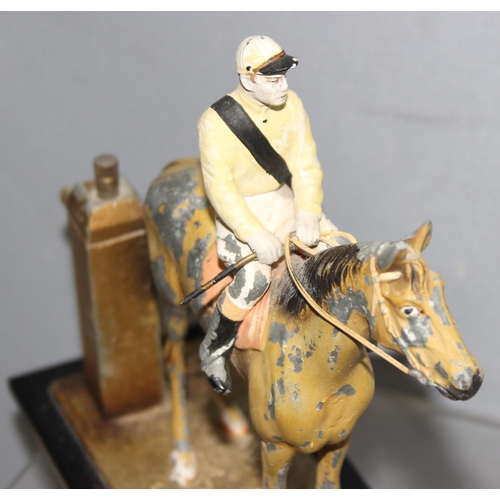 1655A - Austrian made cold painted spelter table lighter in the form of a jockey on horseback, approx 18cm