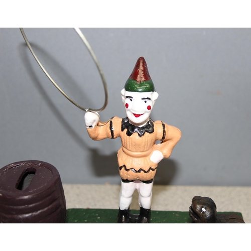 Cast iron Bits & Pieces 'Trick Dog' money box, with box