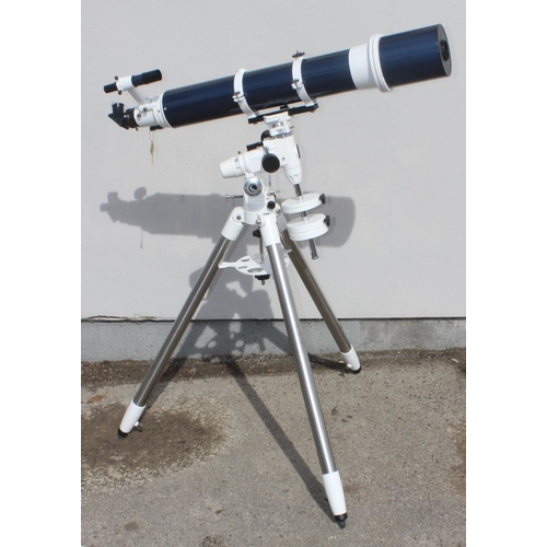 A Celestron Omni XLT 120 celestial telescope on quality tripod base