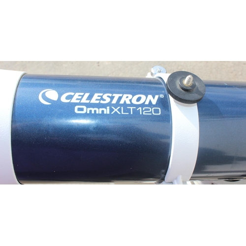 670 - A Celestron Omni XLT 120 celestial telescope on quality tripod base