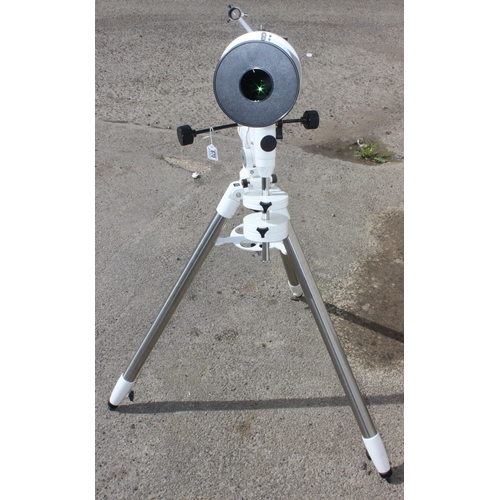 A Celestron Omni XLT 120 celestial telescope on quality tripod base