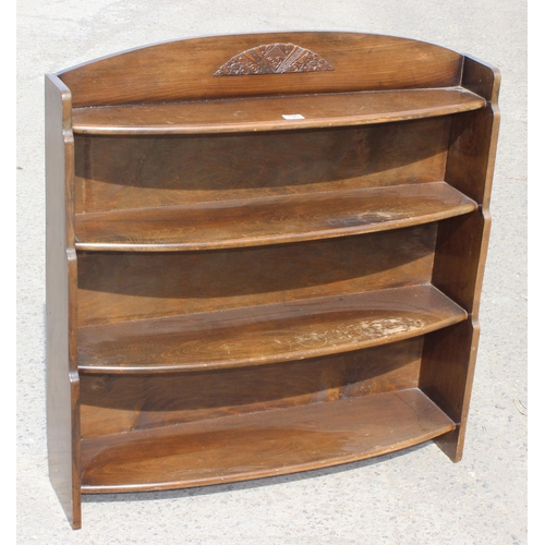 195 - A vintage oak bookcase by D. Harris Ltd of London, approx 96cm wide x 18cm deep x 92cm tall