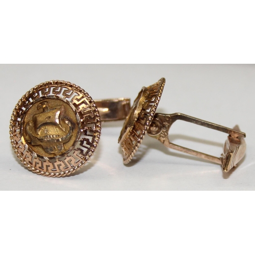 1120C - A pair of mid-century retro 9ct gold cufflinks depicting Viking longboats within a Greek key filigre... 