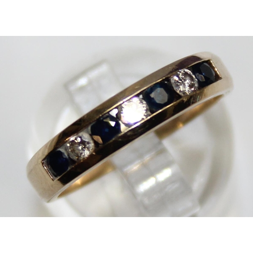 1140E - A retro style 10ct gold ring set with diamonds and sapphires, marked 10k and with 9ct import marks, ... 