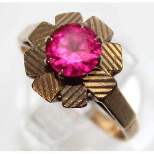 1140L - A retro 9ct gold and pink stone ring in floral setting, likely a Ruby, marked for Birmingham 1968, a... 