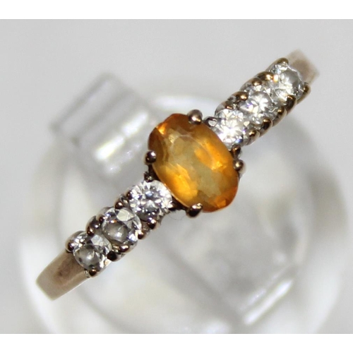 1140N - A 9ct gold citrine and white stone set ring, marked and XRF confirmed, approx size R, approx 1.41g g... 