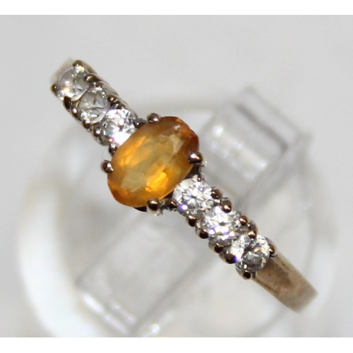 1140N - A 9ct gold citrine and white stone set ring, marked and XRF confirmed, approx size R, approx 1.41g g... 