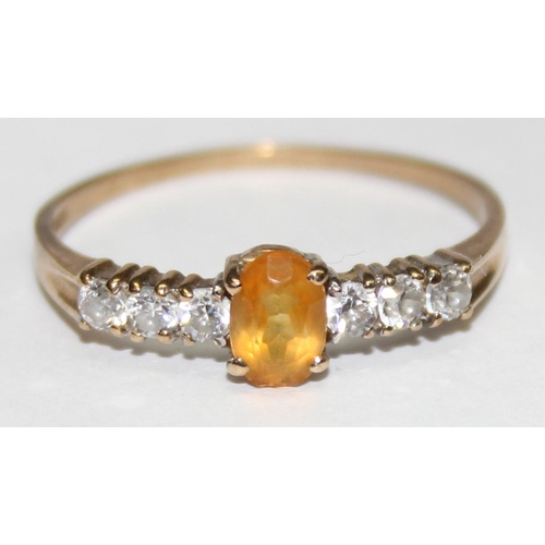 1140N - A 9ct gold citrine and white stone set ring, marked and XRF confirmed, approx size R, approx 1.41g g... 