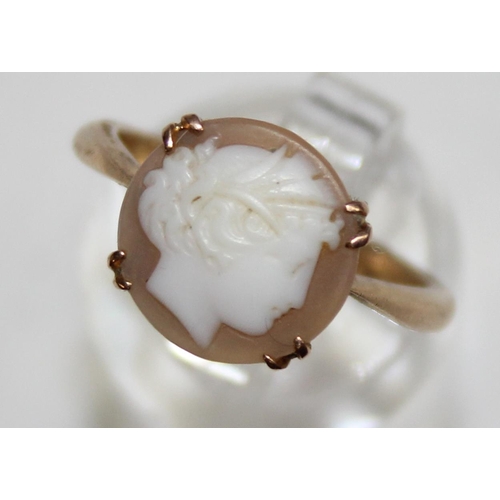 1140O - A vintage 9ct gold mounted shell cameo ring formed as a classical female head, marked and XRF confir... 