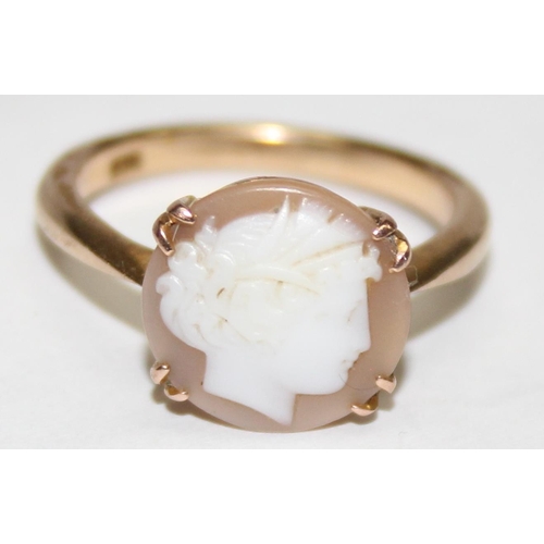 1140O - A vintage 9ct gold mounted shell cameo ring formed as a classical female head, marked and XRF confir... 