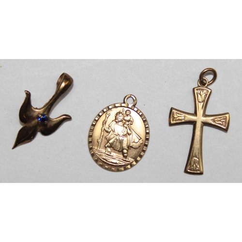 1140Q - 3 assorted 9ct gold pendants to inc a cross, St Christopher and a sapphire set lancet, all marked an... 