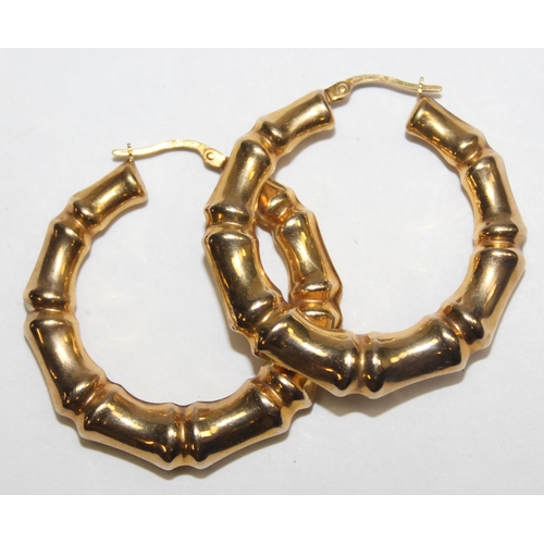 1140S - A large pair of 9ct gold bamboo effect hoop earrings, marked and XRF confirmed, approx 36mm in diame... 