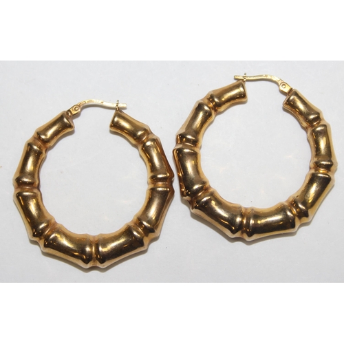 1140S - A large pair of 9ct gold bamboo effect hoop earrings, marked and XRF confirmed, approx 36mm in diame... 