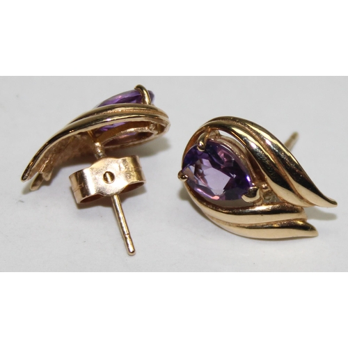 1140V - A pair of 9ct gold and amethyst earrings, marked and XRF confirmed, approx 15mm tall, approx 2.35g g... 