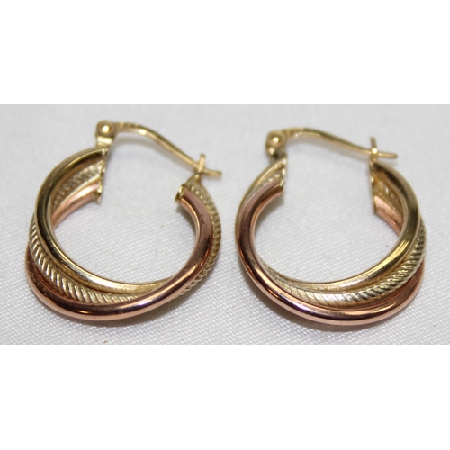 1140Z - A pair of 9ct gold round triple twisted creole hoop earrings, marked and XRF confirmed, approx 24mm ... 