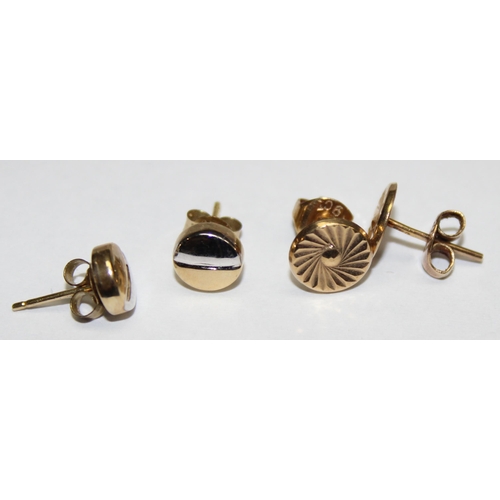 1160E - 2 pairs of 9ct gold stud earrings, one formed as white and yellow gold screws, the other with sunbur... 