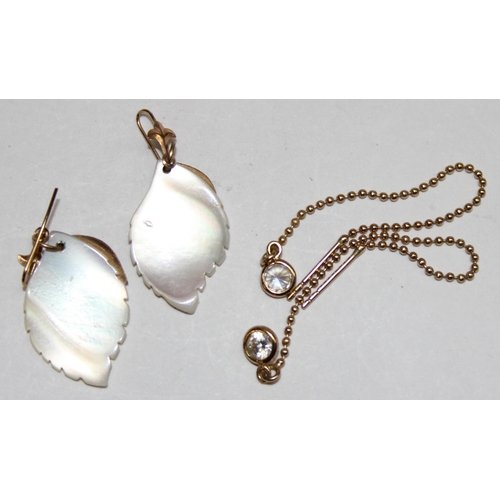 1160F - 2 pairs of 9ct gold mounted earrings, one with mother of pearl leaves and the other with white stone... 