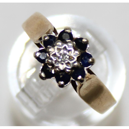 1160Y - A vintage 9ct gold, diamond and sapphire floral set ring, marked and XRF confirmed, approx size P, a... 