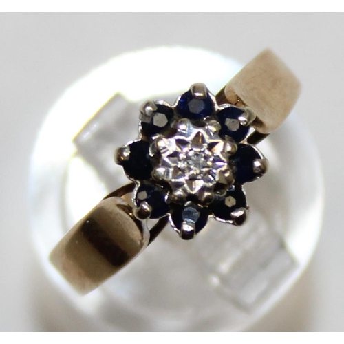 1160Y - A vintage 9ct gold, diamond and sapphire floral set ring, marked and XRF confirmed, approx size P, a... 