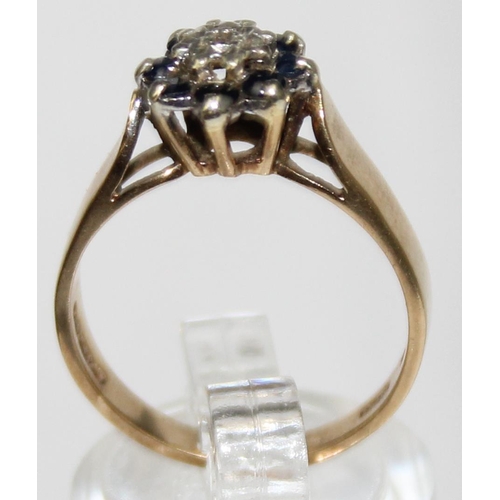 1160Y - A vintage 9ct gold, diamond and sapphire floral set ring, marked and XRF confirmed, approx size P, a... 