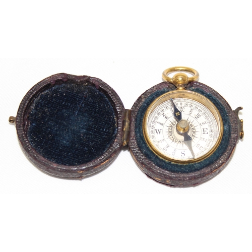 666 - A miniature antique gilt metal cased pocket compass by Negretti & Zambra, housed in original leather... 