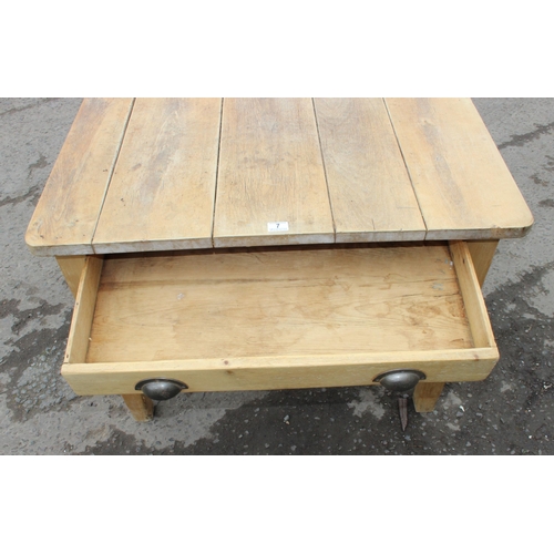 126 - A rustic pine farmhouse kitchen table with long single drawer and 5 plank top, approx 116cm wide x 9... 