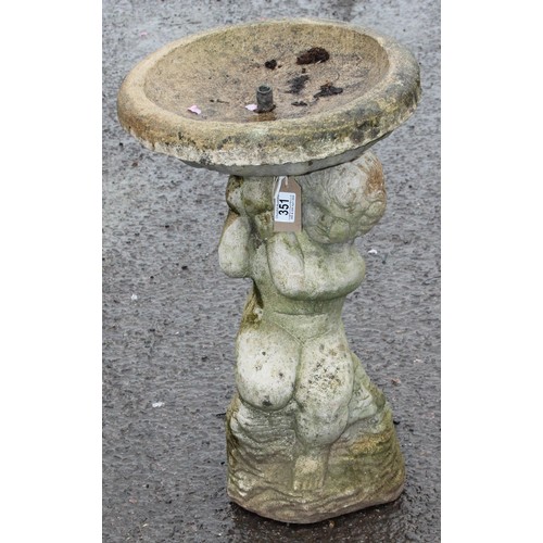 375 - A weathered concrete fountain formed as a cherub holding a basin, approx 37cm wide x 37cm deep x 62c... 