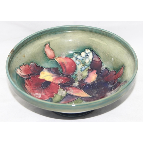 1604G - Moorcroft pottery footed bowl in the Orchid pattern (af), approx 17cm diam