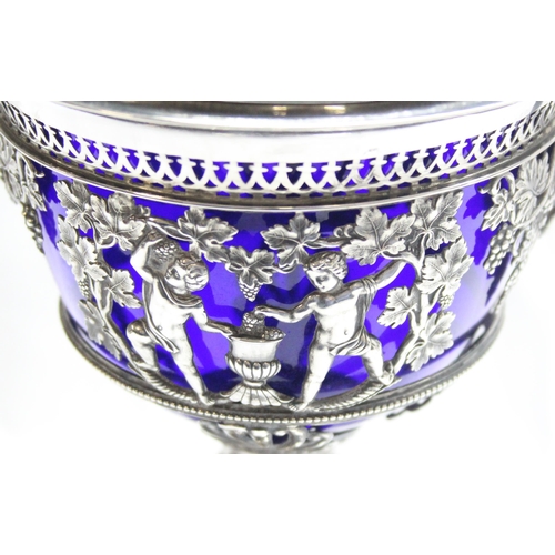 1001 - An interesting antique silver dish or table centrepiece with lid and blue glass liner, marked indist... 