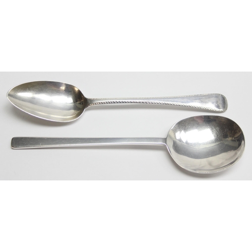 1004 - A silver spoon of 17th century form, marked for London 1906 by William Comyns and a Georgian silver ... 