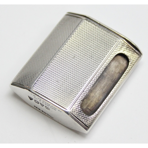 1010 - An unusual antique silver vesta cased of squashed hexagonal form with engine turned finish, Chester ... 