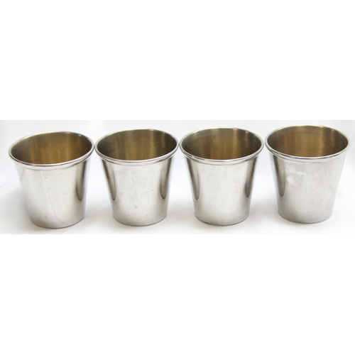 1016 - A vintage silver plated travelling cocktail shaker with 4 small beakers, all housed in a leather cas... 