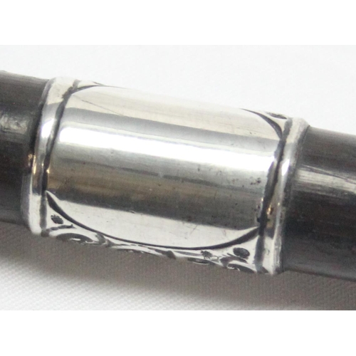 1020 - An antique ebonised and silver mounted conductor's baton, marked for London 1910, approx 46cm long