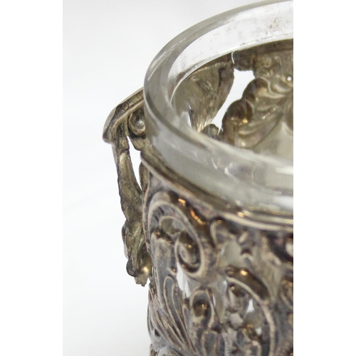 1020C - A silver covered jar, marked for Chester 1899 and a 19th century German silver server by Brahmfeld &... 