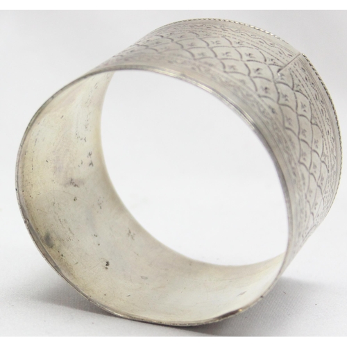 1033 - A very large French silver napkin ring, marked and XRF confirmed as approx 82% silver, approx 55mm i... 