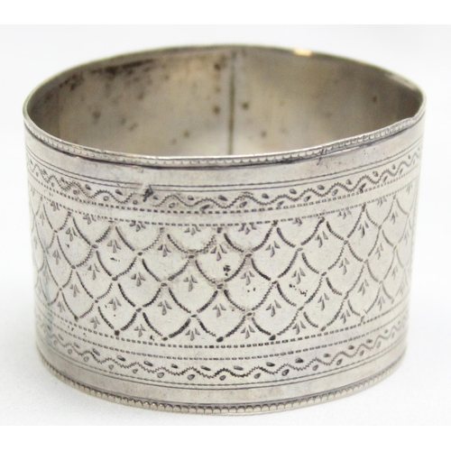 1033 - A very large French silver napkin ring, marked and XRF confirmed as approx 82% silver, approx 55mm i... 