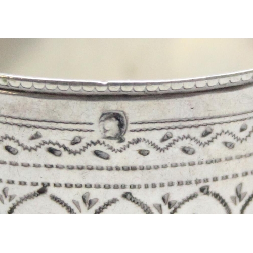 1033 - A very large French silver napkin ring, marked and XRF confirmed as approx 82% silver, approx 55mm i... 