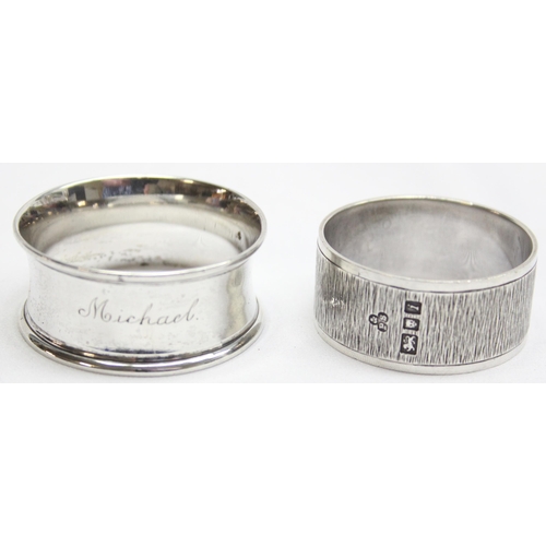 1042 - 2 silver napkin rings, one with retro bark effect design marked for London 1964 by Payne & Son of Ox... 