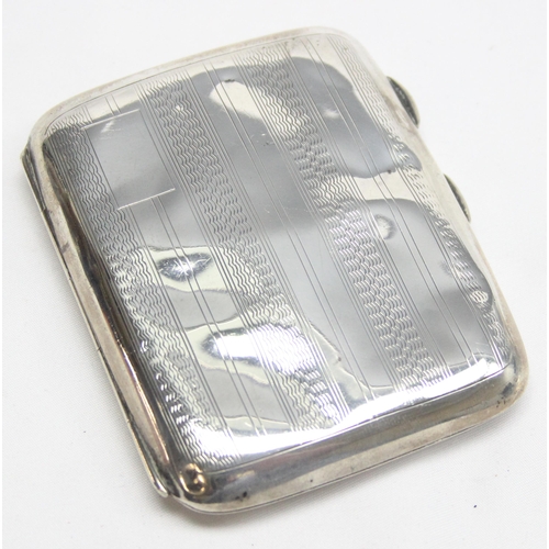 1045 - A vintage silver cigarette case, Birmingham 1931 by Joseph Gloster Ltd, approx 56.64g gross